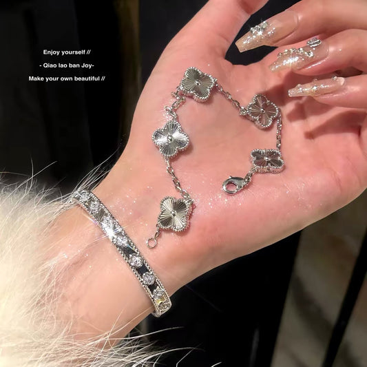 Silver Four Leaf Clover Bracelet by Sylrena — product photo