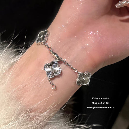 Silver Four Leaf Clover Bracelet by Sylrena — product photo