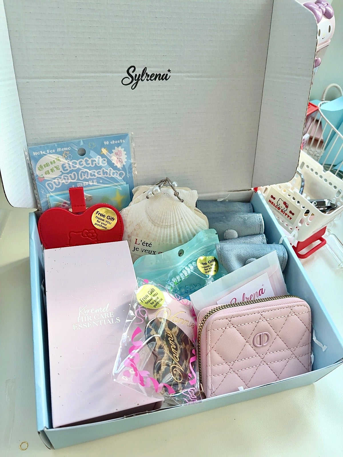 Lucky Scoop sample packaging with jewelry and surprise accessories; items vary by order.